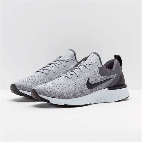 grey Nike running shoes women's